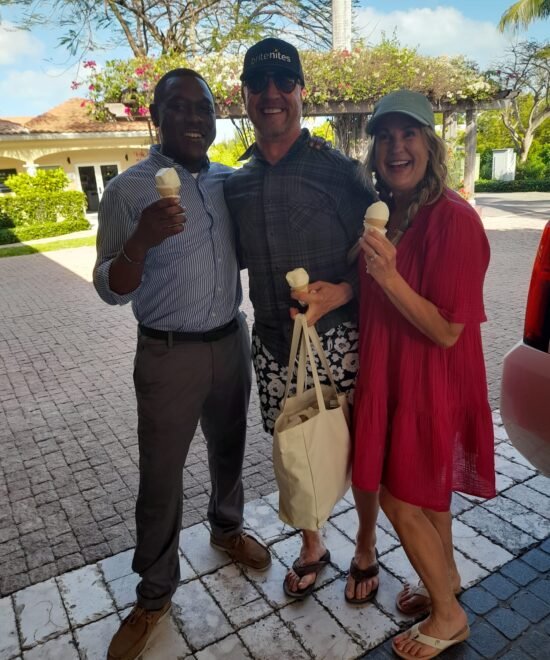 Secure Taxi driver enjoying a friendly moment with two guests